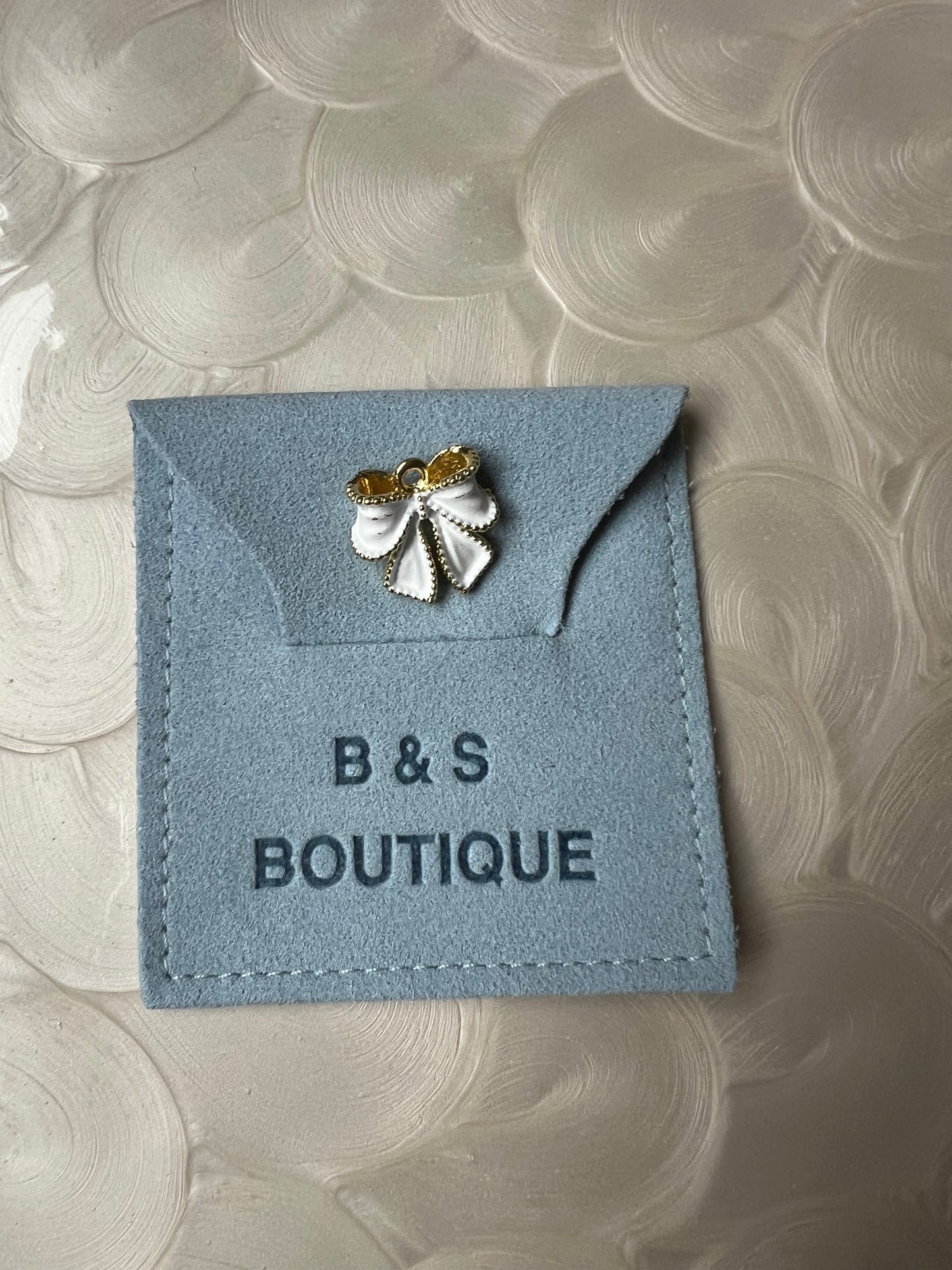 Bow Charm 1